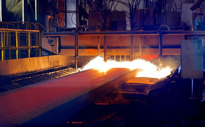 Torch cutting at a Primetals Technologies stainless steel caster