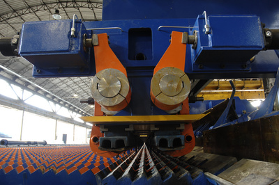 High-speed delivery system of a bar mill