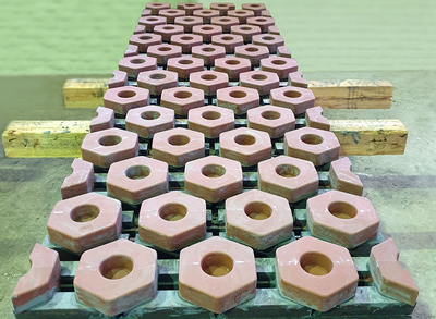 Copper staves with hexagonal inserts from Primetals Technologies ready for inspection prior to delivery.
